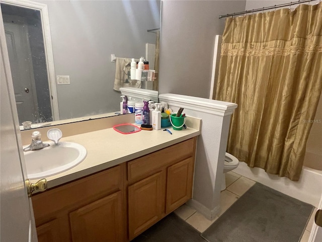 full bathroom with vanity, toilet, tile patterned flooring, and shower / tub combo with curtain