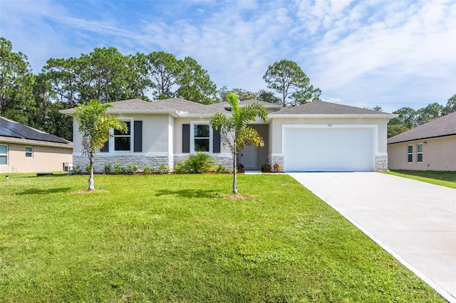 ranch-style house featuring a garage and a front lawn