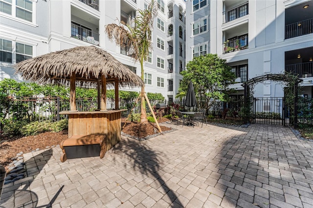 view of home's community featuring a patio area