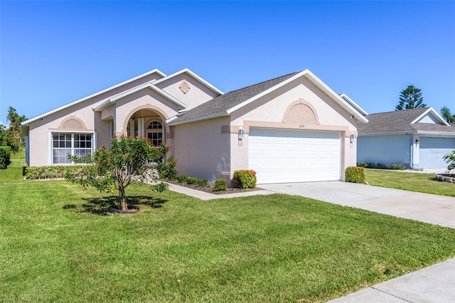 ranch-style house with a front yard and a garage