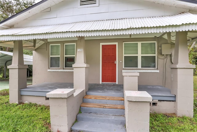 property entrance with a porch