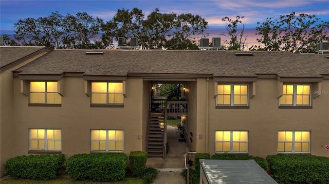 view of front of home featuring cooling unit