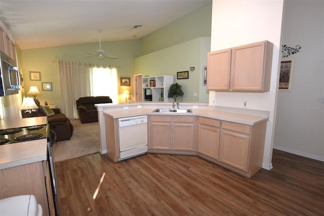 kitchen featuring light brown cabinetry, dishwasher, kitchen peninsula, and dark wood-type flooring