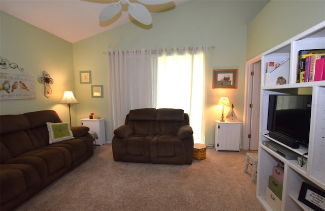 carpeted living room featuring lofted ceiling and ceiling fan