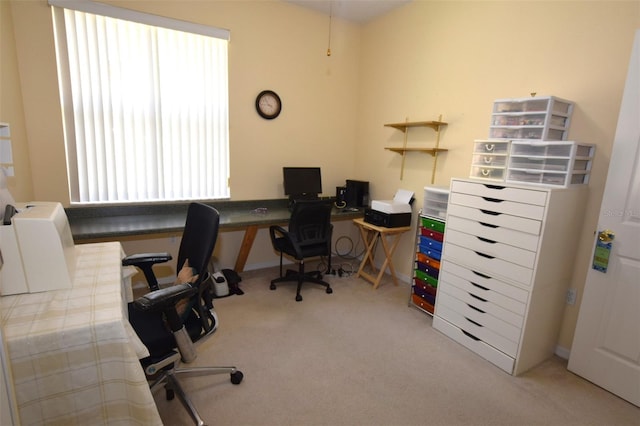 carpeted office space featuring plenty of natural light