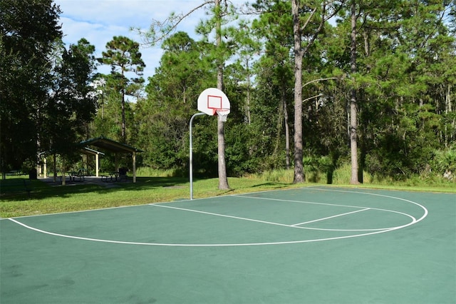 view of sport court with a gazebo and a lawn