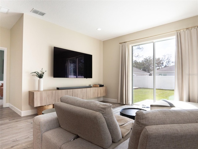 living room featuring light wood-type flooring