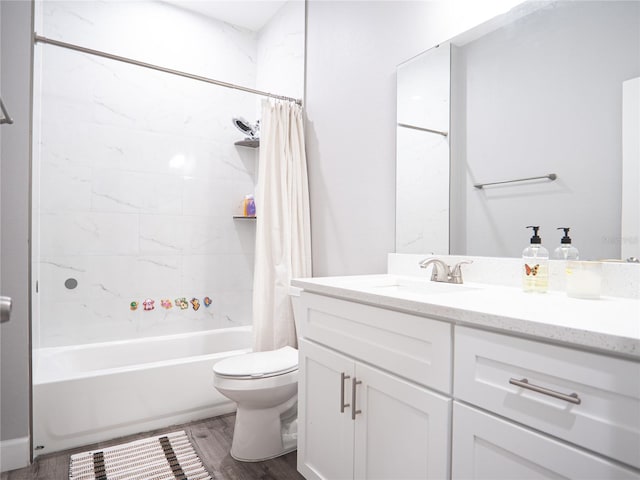 full bathroom featuring vanity, shower / bath combination with curtain, hardwood / wood-style flooring, and toilet