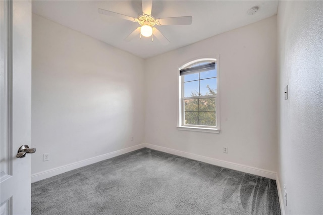 unfurnished room featuring carpet and ceiling fan