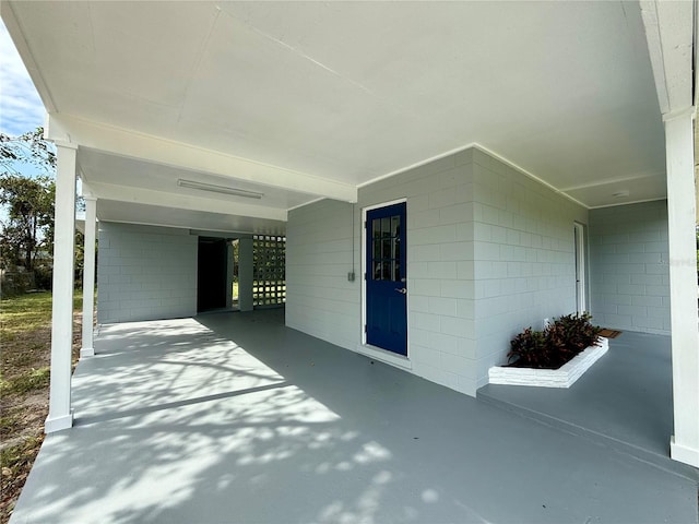 view of patio with a carport