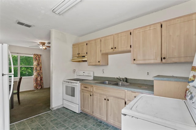 kitchen featuring white appliances, washer / clothes dryer, sink, light brown cabinetry, and ceiling fan