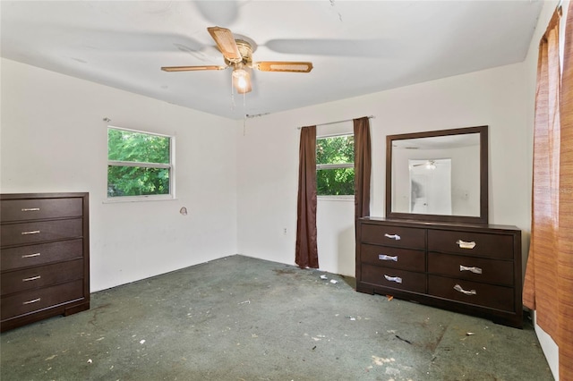 unfurnished bedroom featuring ceiling fan