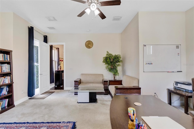 interior space featuring ceiling fan