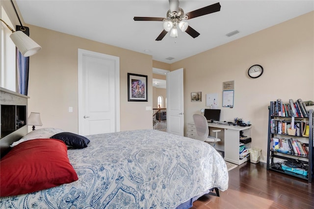 bedroom featuring ceiling fan and dark hardwood / wood-style flooring