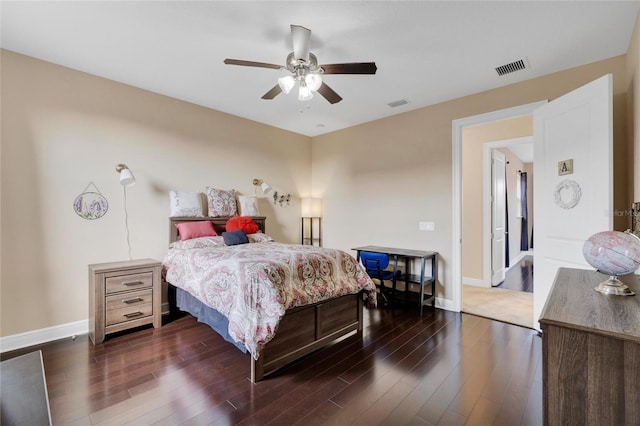 bedroom featuring ceiling fan and dark hardwood / wood-style floors