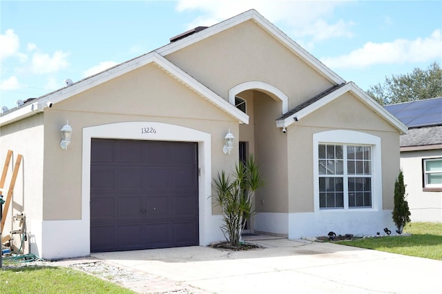 single story home with a garage