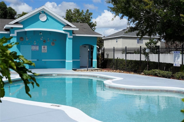 view of pool featuring an outdoor structure