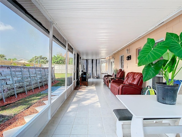 sunroom / solarium featuring a wealth of natural light