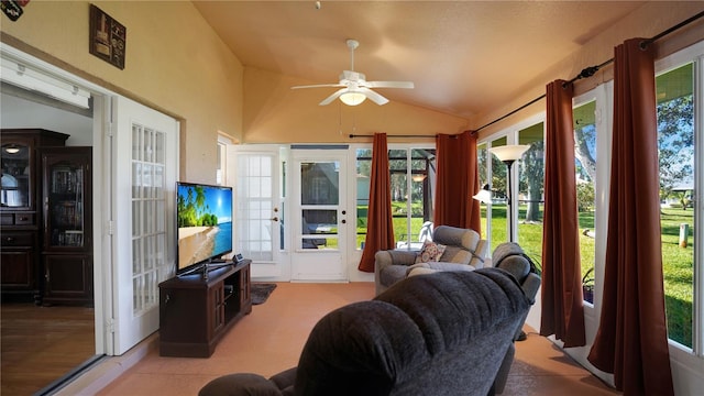 sunroom / solarium with lofted ceiling and ceiling fan