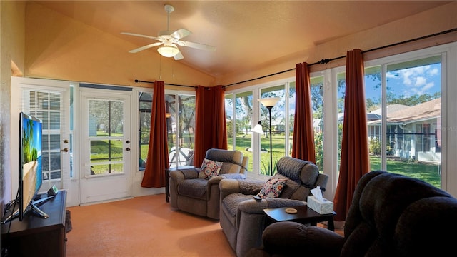 sunroom with lofted ceiling and ceiling fan