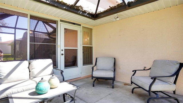 view of patio / terrace with glass enclosure