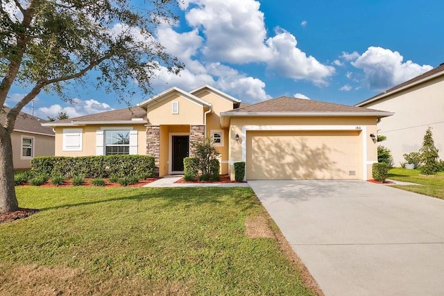 view of front facade featuring a front lawn and a garage