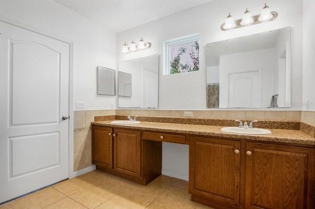 bathroom featuring vanity and tile patterned flooring