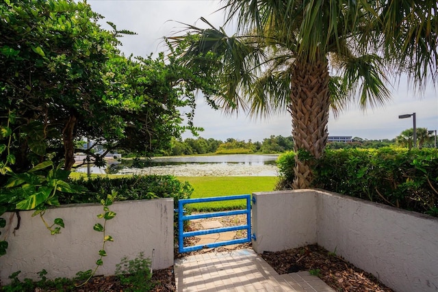 view of patio with a water view