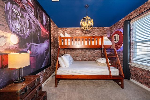 bedroom featuring carpet flooring and brick wall