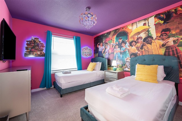 carpeted bedroom featuring a notable chandelier and a textured ceiling