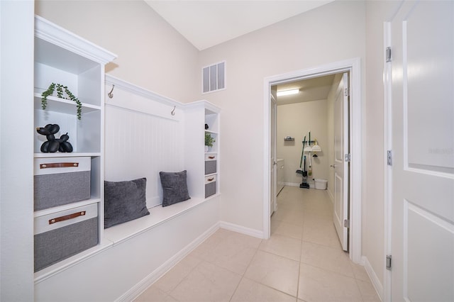 hallway featuring light tile patterned floors