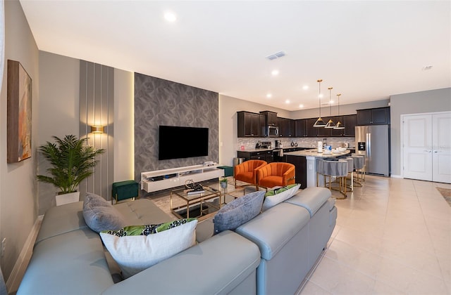 living room with light tile patterned floors