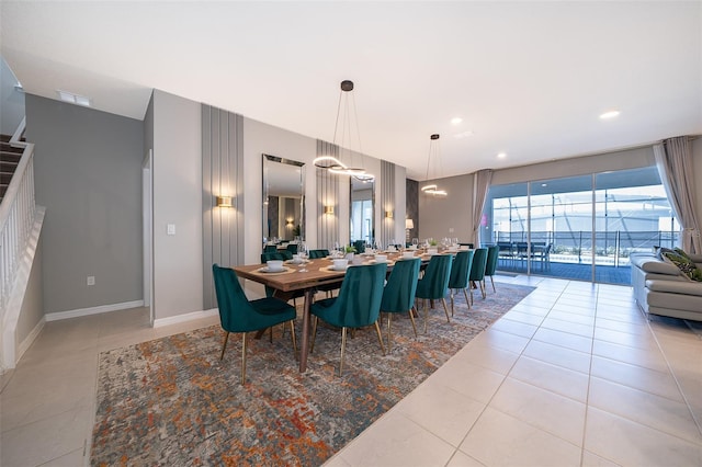 dining area featuring light tile patterned flooring