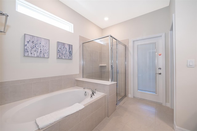 bathroom featuring tile patterned floors and plus walk in shower