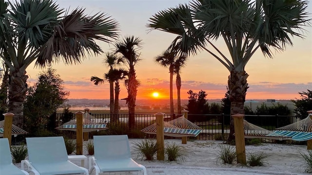 view of patio terrace at dusk