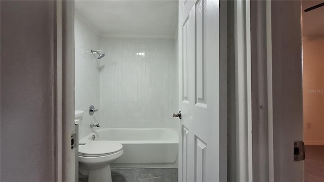 bathroom with toilet and shower / bathing tub combination