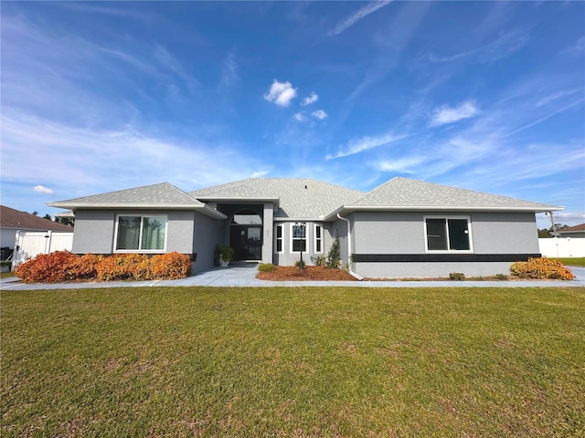 view of front of property with a front lawn