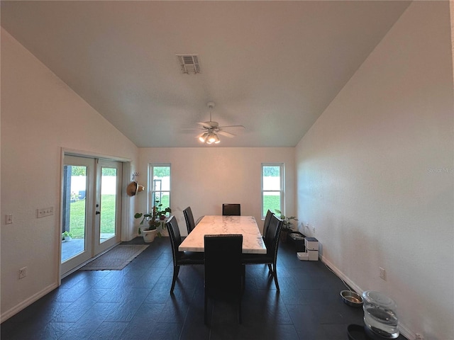 dining room featuring french doors, ceiling fan, and vaulted ceiling