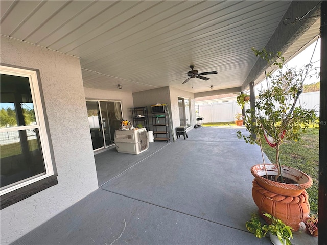 view of patio / terrace featuring ceiling fan