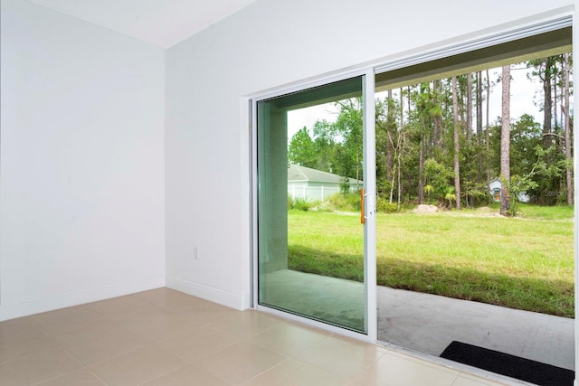 doorway featuring light tile patterned floors