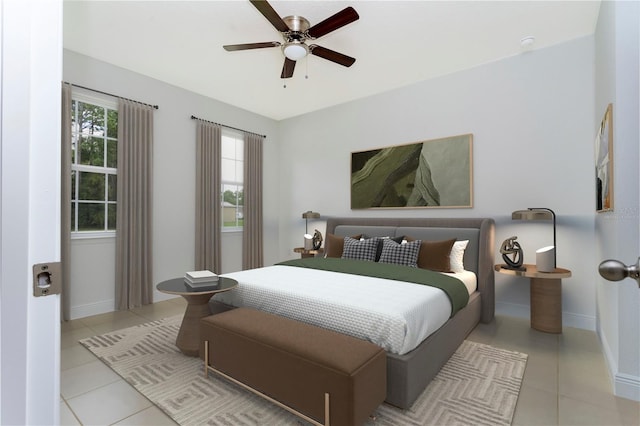 tiled bedroom with ceiling fan