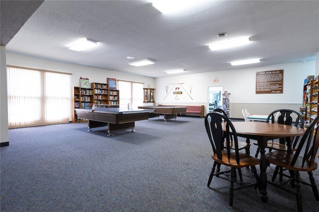 game room with carpet, a textured ceiling, and billiards