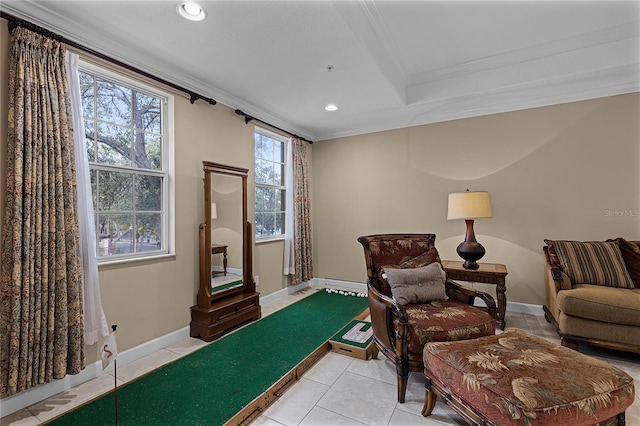 sitting room with crown molding and light tile patterned flooring