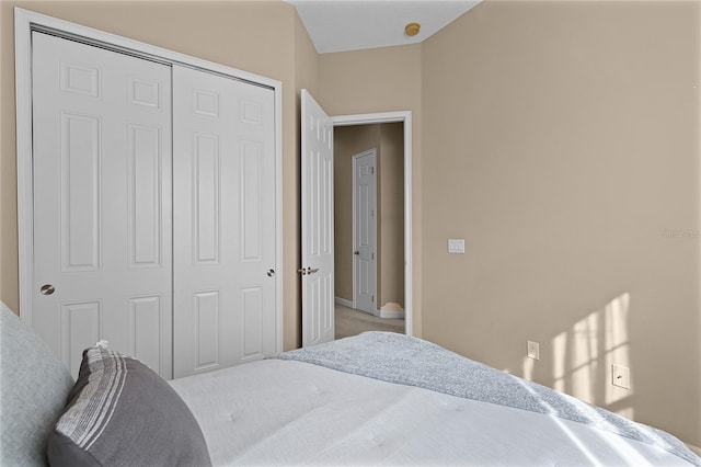 bedroom featuring a closet and carpet