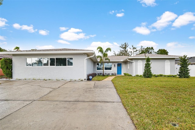 single story home with a front yard