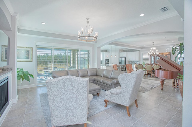 tiled living room with crown molding and a wealth of natural light