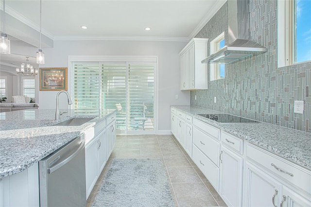 kitchen featuring dishwasher, wall chimney range hood, decorative light fixtures, white cabinetry, and light stone counters