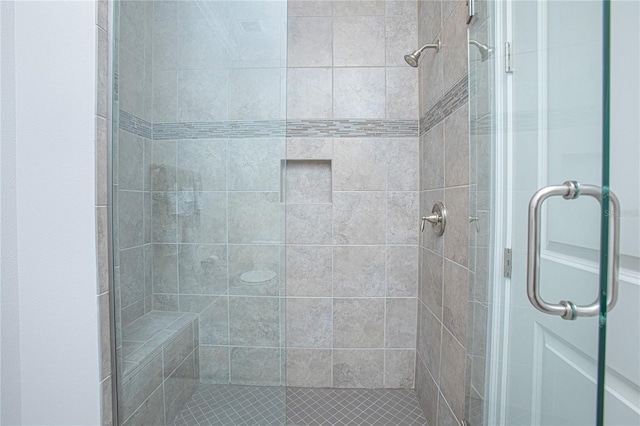 bathroom featuring walk in shower