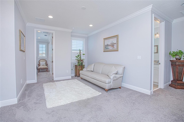 unfurnished room with crown molding and light colored carpet