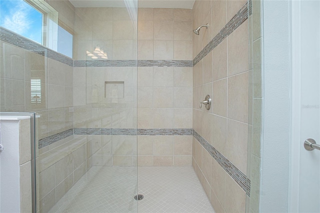 bathroom featuring walk in shower